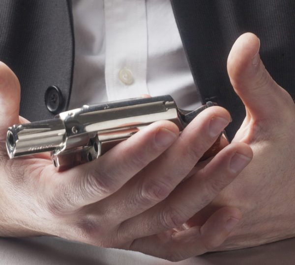 Holding a Weapon